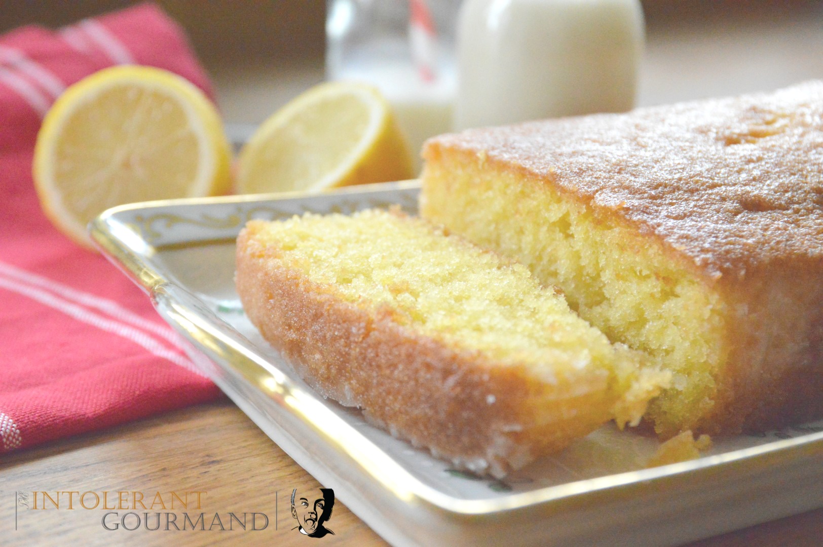 Gluten free dairy free lemon drizzle cake - a deliciously light and fluffy sponge made with Free From Fairy flour www.intolerantgourmand.com