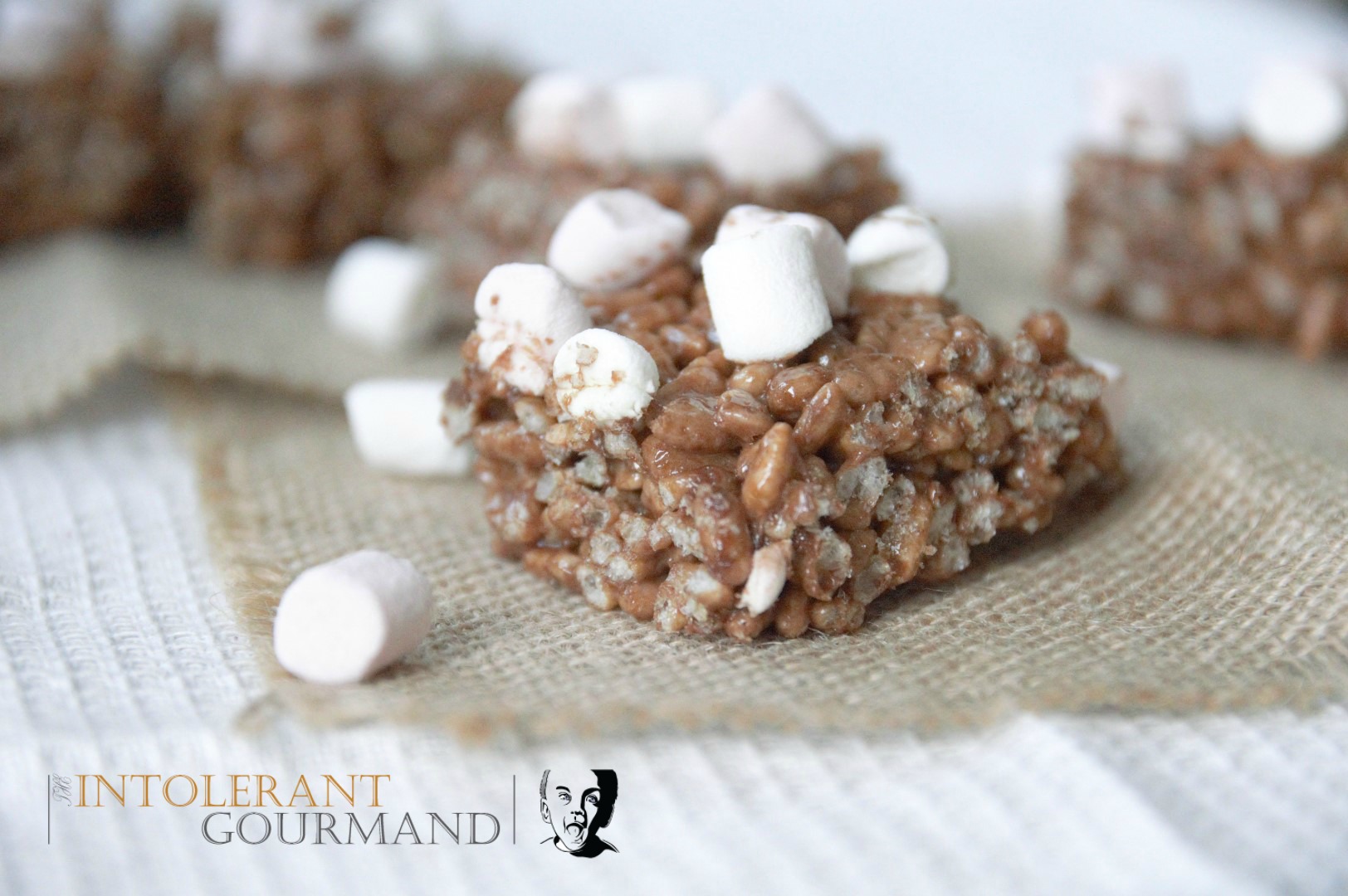 Chocolate marshmallow crispie squares - dairy-free, gluten-free, wheat-free, egg-free, nut-free, vegan and delicious! www.intolerantgourmand.com