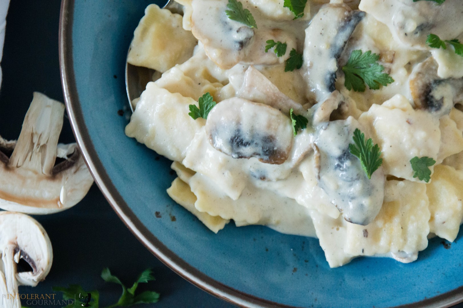 Creamy Mushroom Sauce with Pumpkin Raviolini - the delicious fusion of pumpkin with a creamy comforting sauce to bring you the ultimate bowl of comfort food! Perfect for lunch or dinner and dairy and gluten-free too! www.intolerantgourmand.com