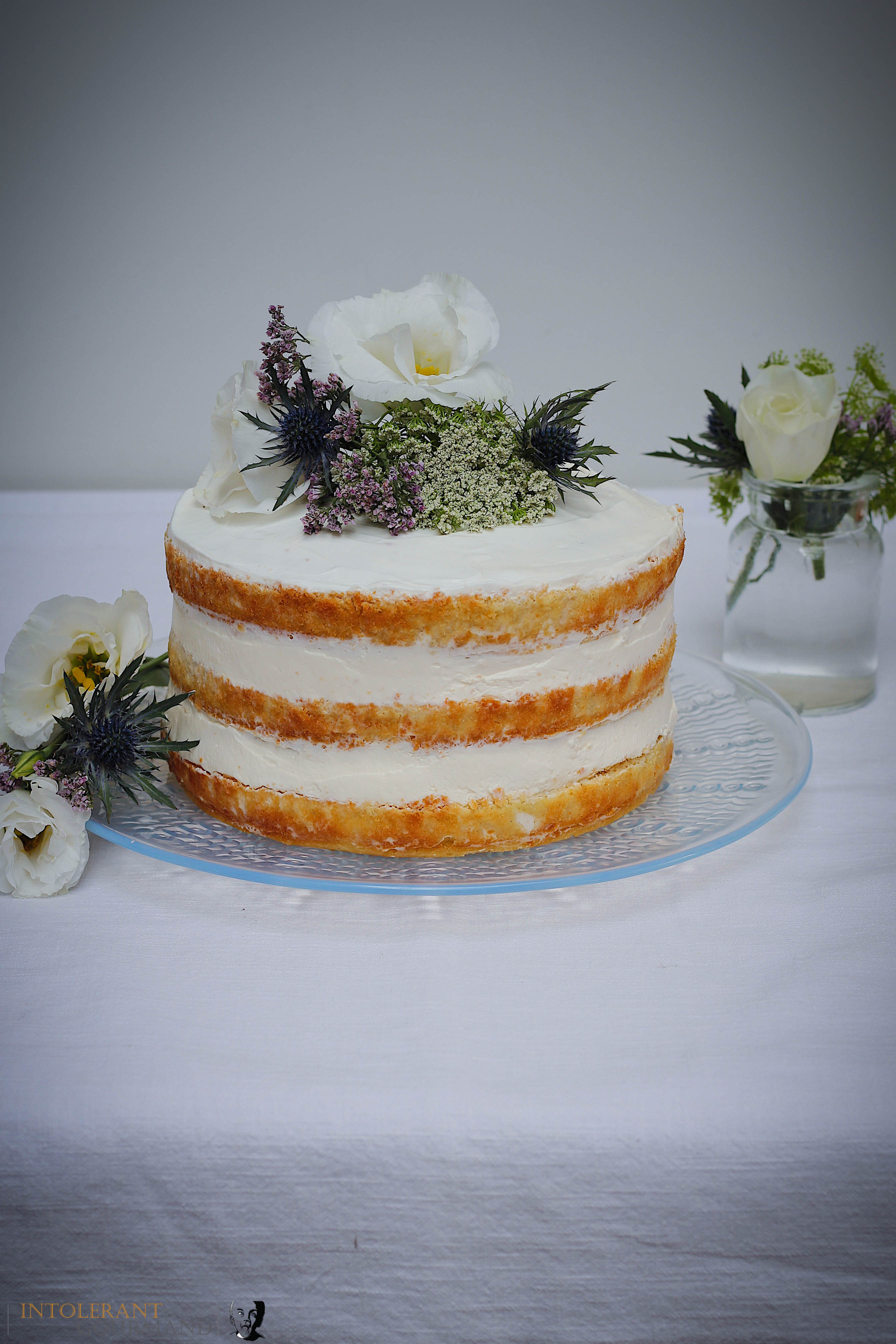 Royal Wedding Cake - Elderflower and lemon cake. A beautiful 3 tiered light and delicate sponge cake, that is gluten-free and dairy-free. Perfect for any celebration, or simply just because! www.intolerantgourmand.com