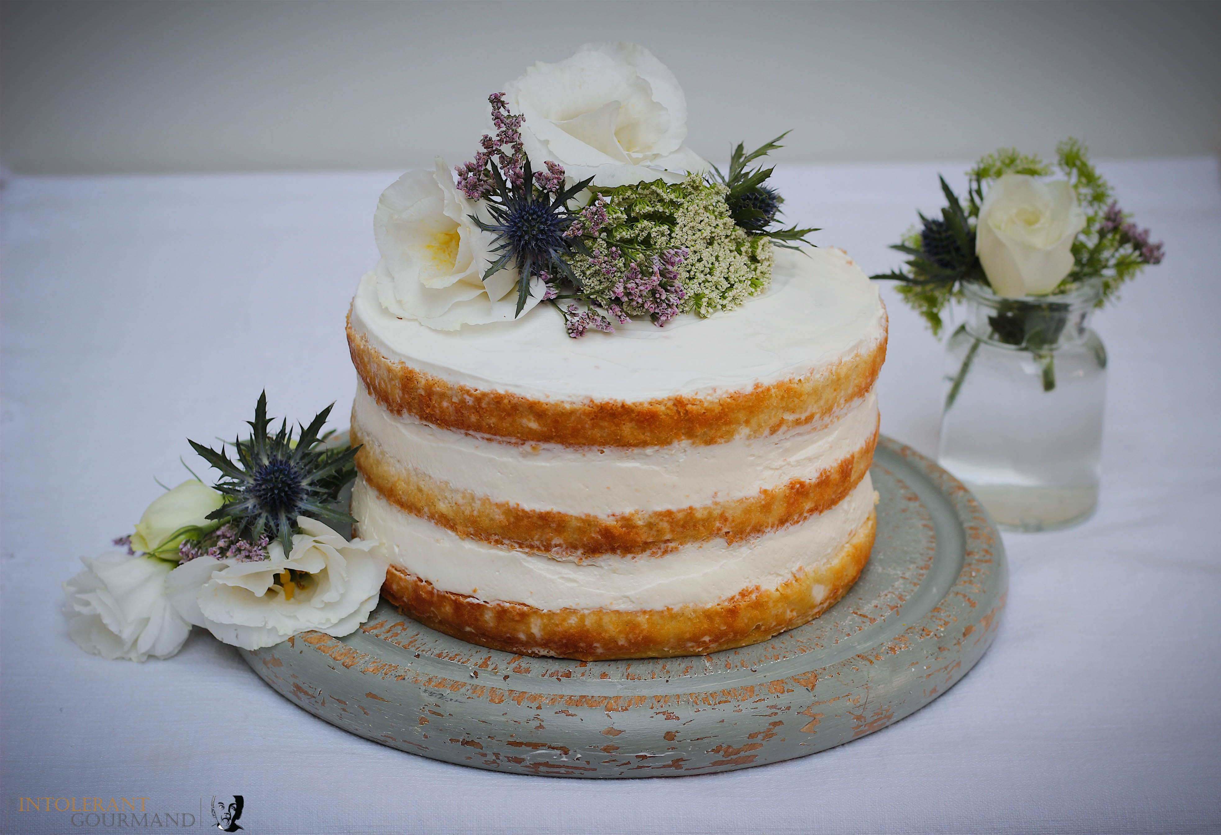 Wifes latest wedding creation. Top tier is lemon drizzle, bottom is  Elizabeth sponge. With fresh flowers. : r/Baking